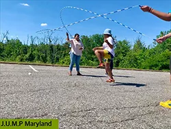 photo of teens jumping rope
